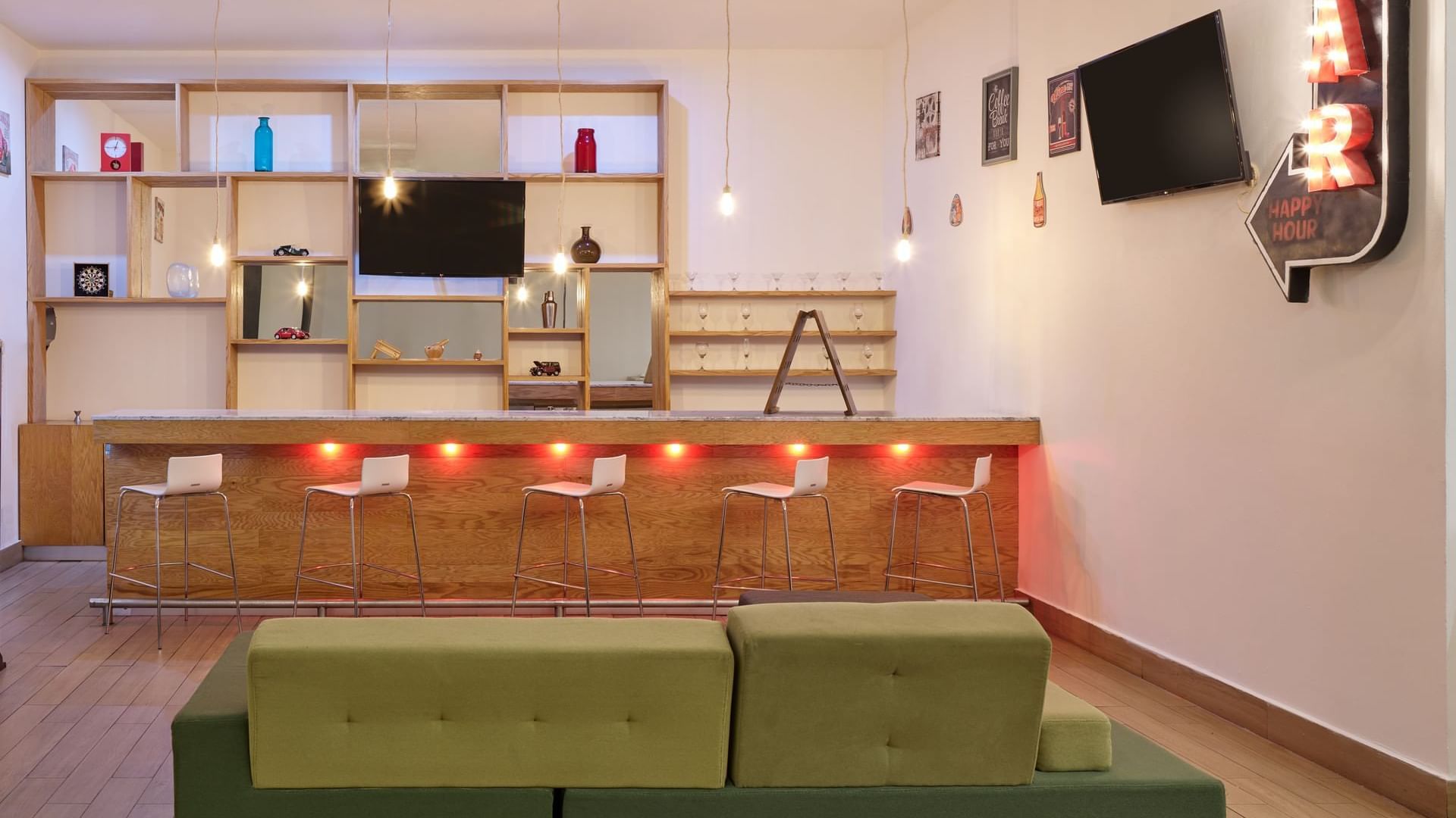 Lounge Bar with pub table and chairs at Fiesta Inn Durango