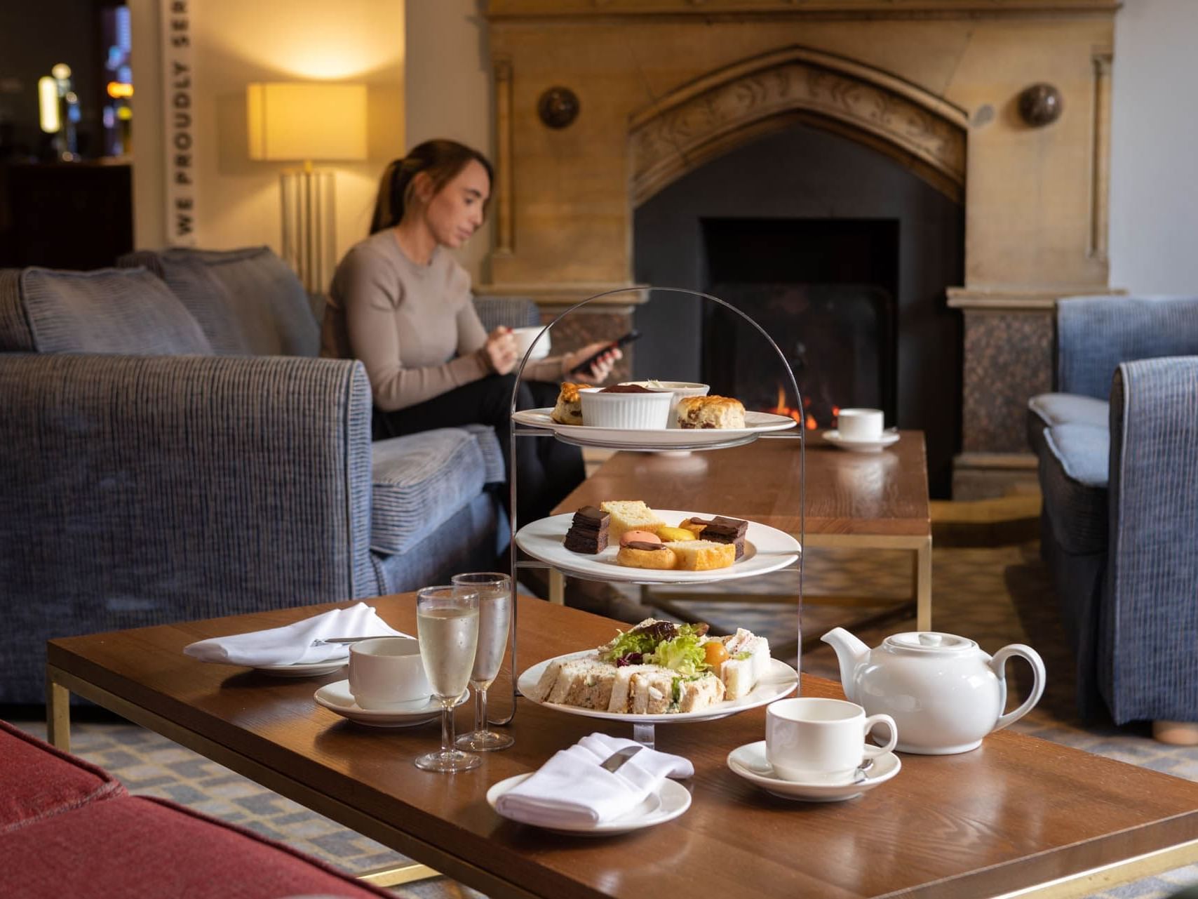 Afternoon tea on the table in a suite at Bridgewood Manor Hotel