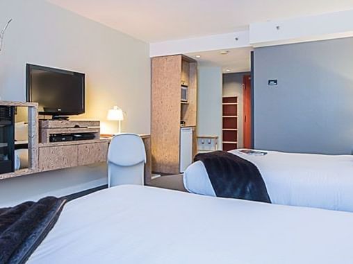 Hotel room with two beds.