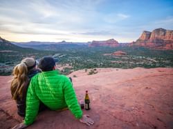 A couple enjoying the view of a beautiful landscape