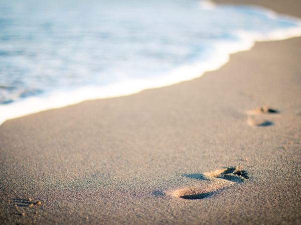 Foot steps in the ocean at Inn at Avila Beach