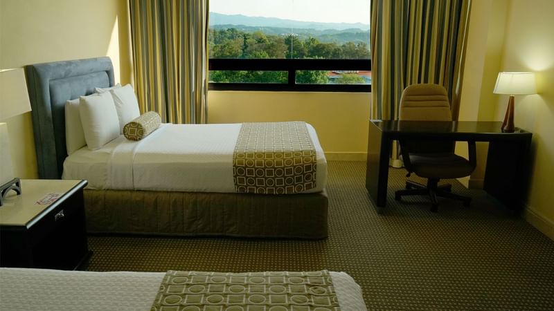 Twin beds in Gamma Xalapa Nubara of Gamma Hotels