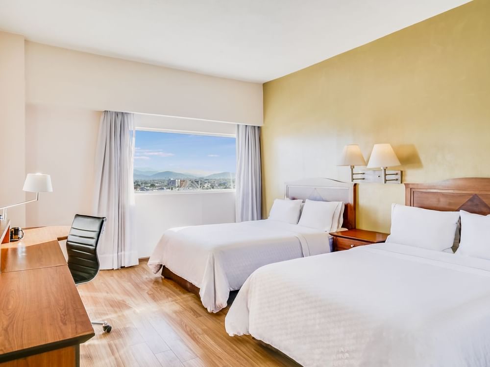 Double beds in Superior Room at Fiesta Americana Travelty