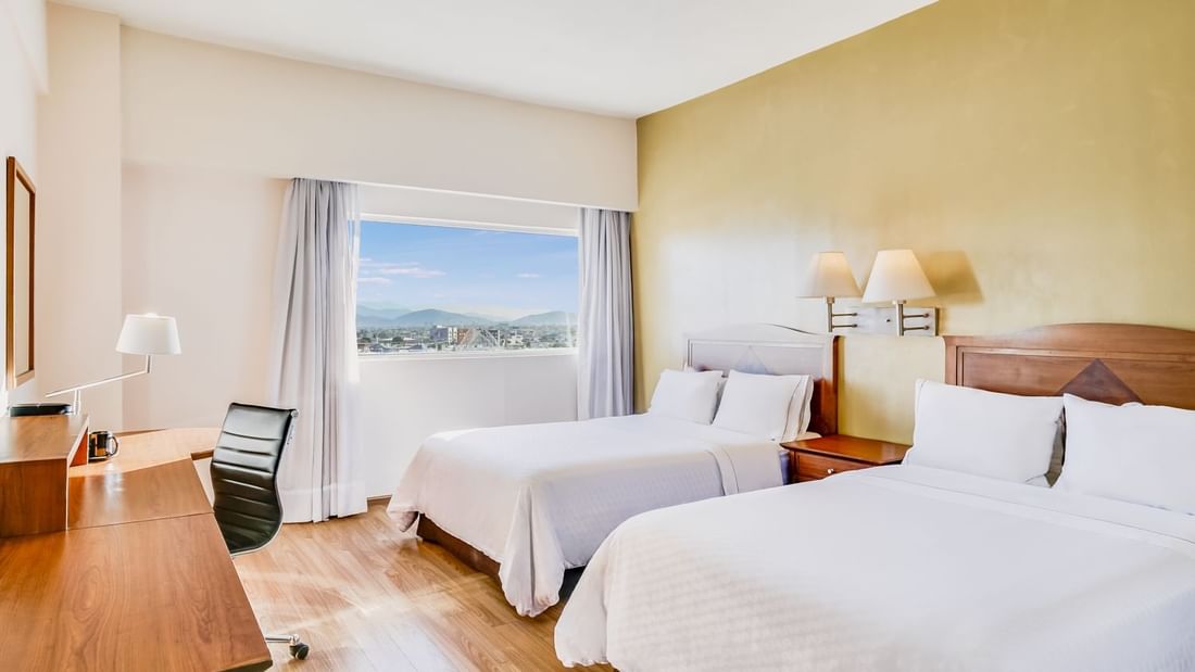 Double beds in Superior Room at Fiesta Americana Travelty