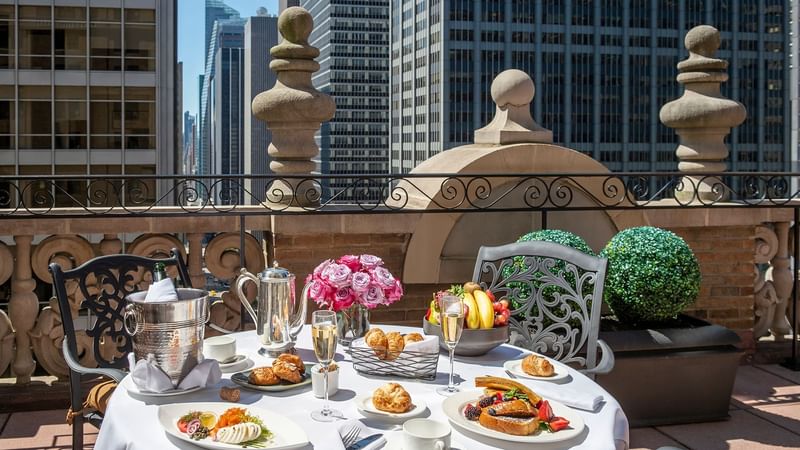 Breakfast served on a table in Suite of the Stars at Warwick New York
