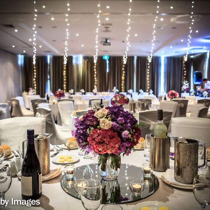 Decorated wedding hall tables at Mercure Kooindah Waters