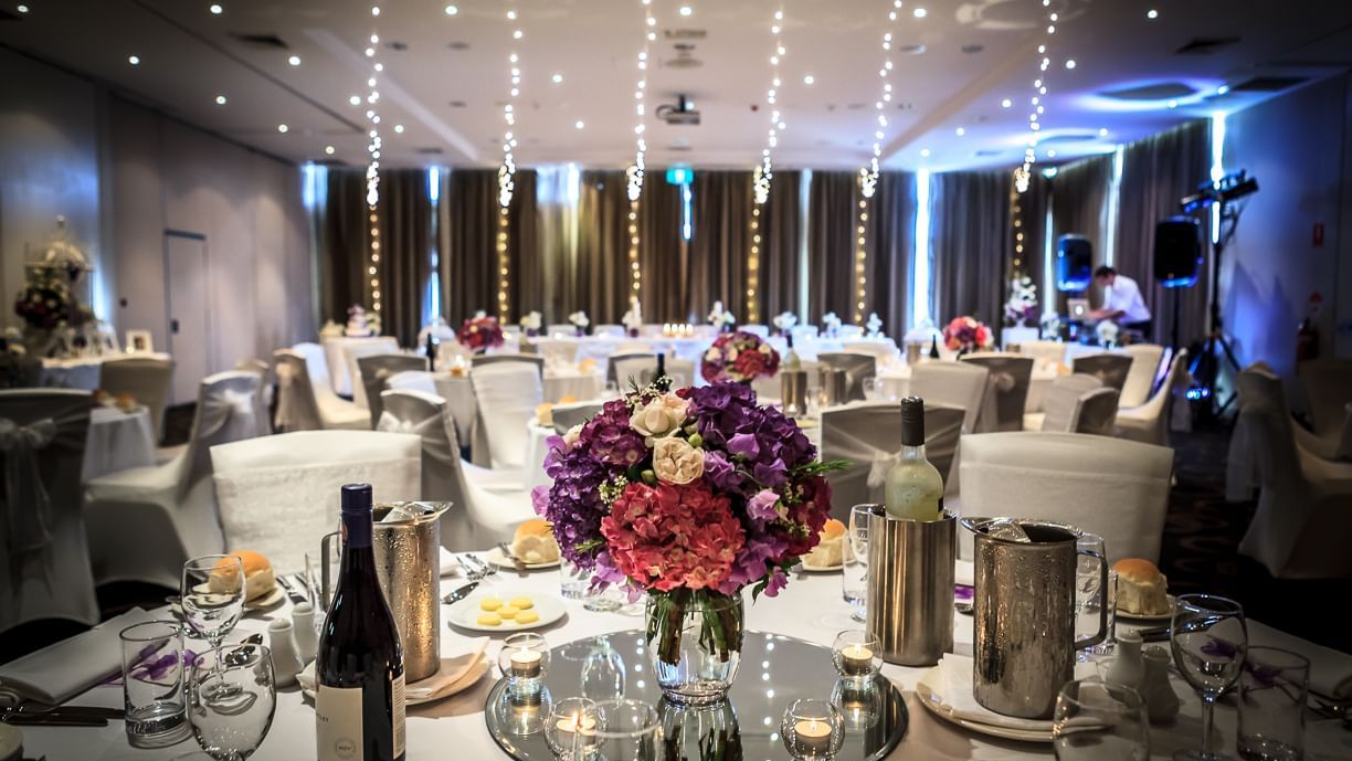Decorated wedding hall tables at Mercure Kooindah Waters