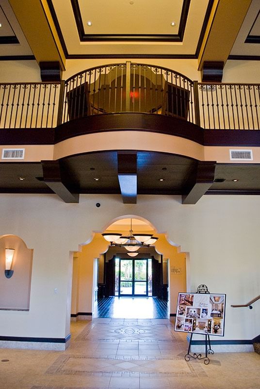 Lobby area with chandelier and balcony at Lake Buena Vista Resort Village & Spa