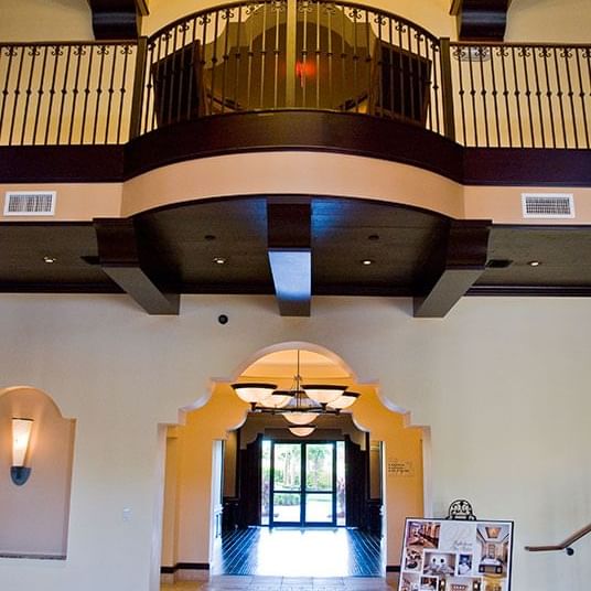 Lobby area with chandelier and balcony at Lake Buena Vista Resort Village & Spa