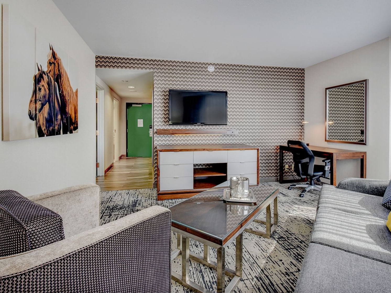Lounge with a Tv in King Executive Suite at The Grove Hotel