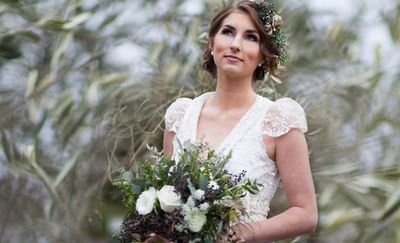 Bride holding flowers