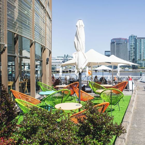 Outdoor dining area of Berth Restaurant near Nesuto Docklands