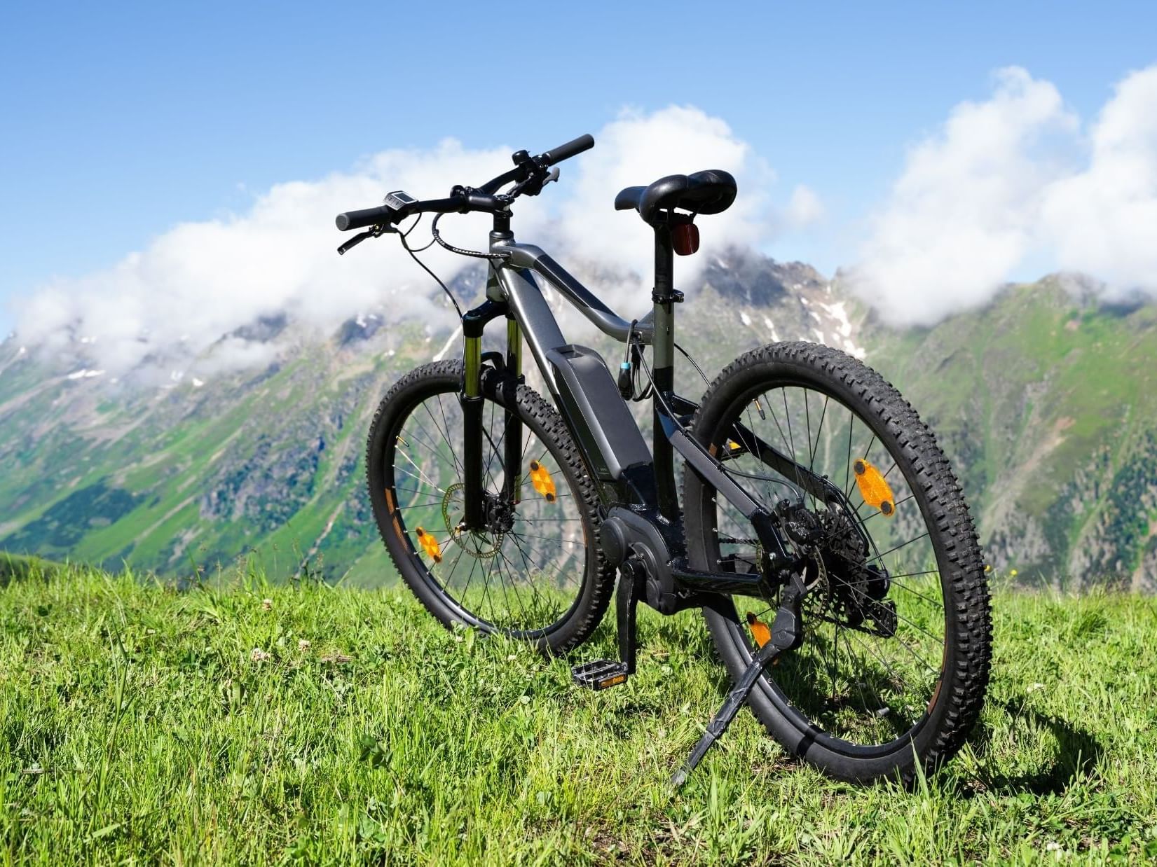 A cycle on a hilltop with mountain view near Ana Hotels