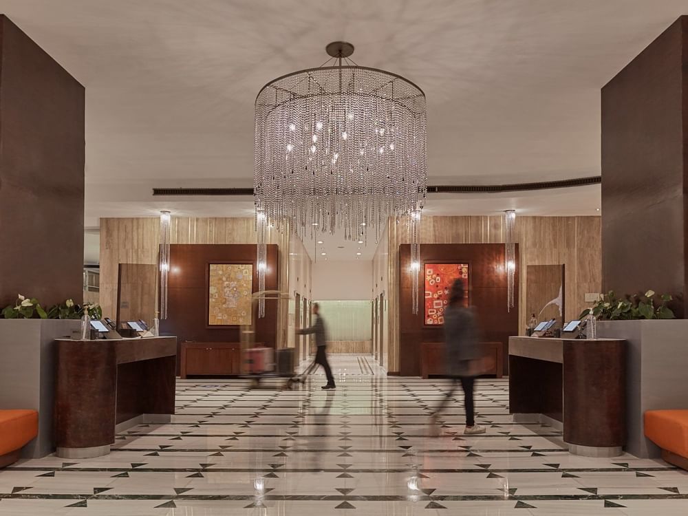 Hotel lobby with a Chandelier at Curamoria Collection