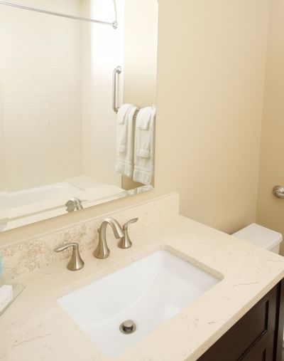 Bathroom vanity with mirror at Mt. Washington Conference Center
