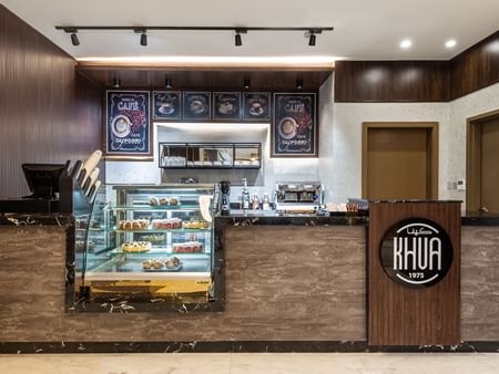 Counter with food showcase in KHVA Café at Warwick Riyadh