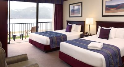 Two queen beds and balcony with lake view in West Tower: Lake View Two Queens at Harrison Hot Springs Resort