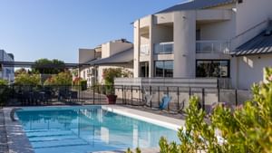 Outdoor pool at Hotel Les Domes of The Originals Hotels