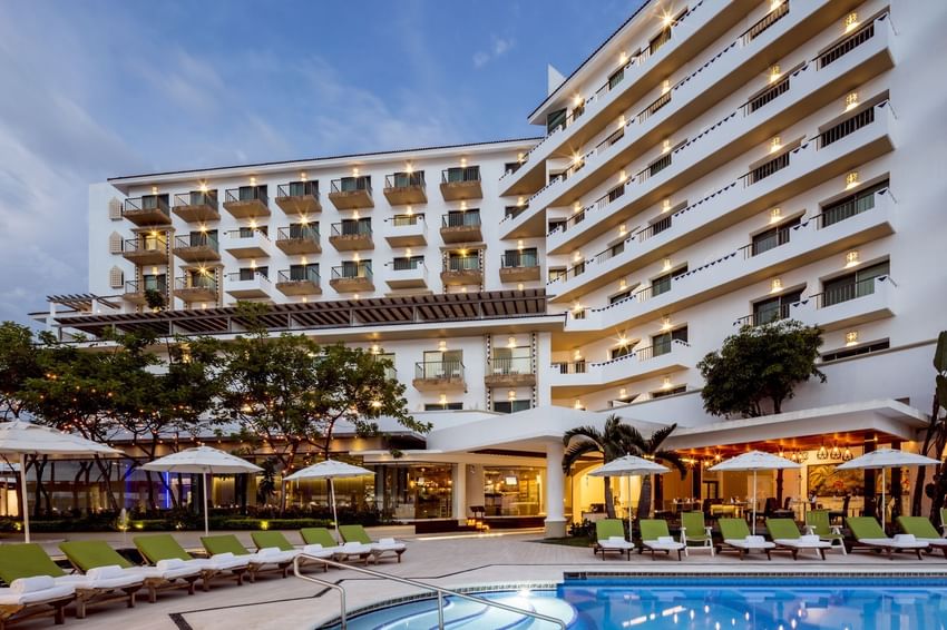 Low-angle exterior of Villa Premiere Boutique Hotel & Romantic Getaway by the pool