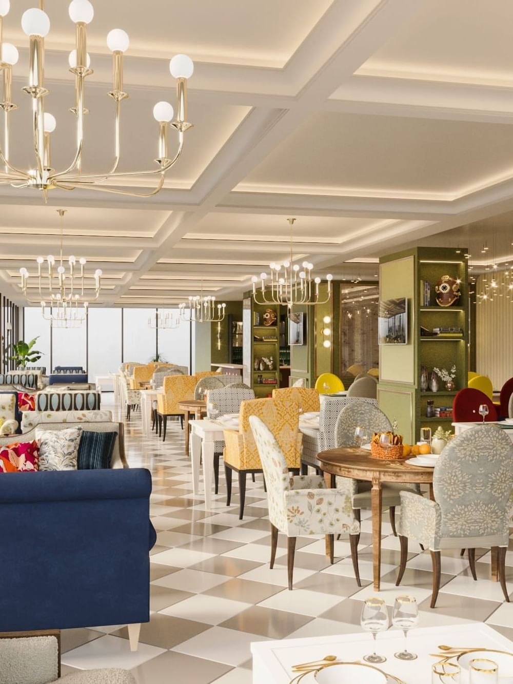 Patterned dining chairs by round wooden tables under gold chandeliers in The Tower View at Cantonal Hotel by Warwick Riyadh
