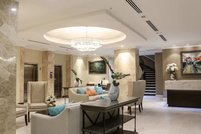 lobby with elevators and stairs