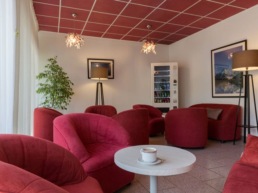 Interior of a lounge area at Hotel L'Arc-En-Ciel