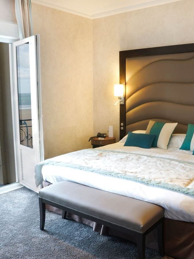 Double bed in Croisiere Salon Room with outdoor sea view at Le Grand Hôtel des Thermes