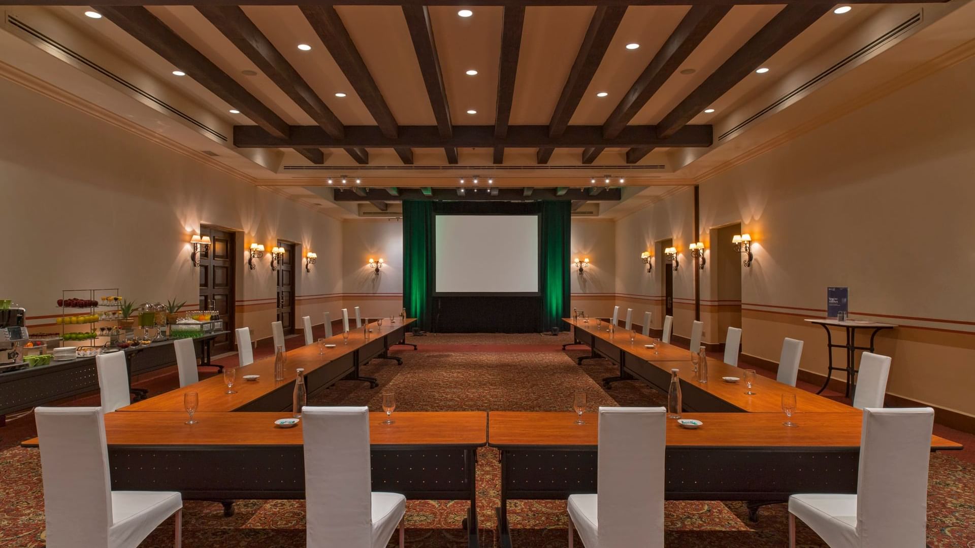 Arcos Room's U-shape table arrangements with comfortable seating at Hacienda del Mar Los Cabos