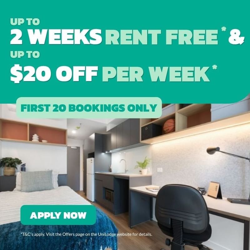Modern studio apartment with kitchenette, desk, and bed featuring a promotional offer for UniLodge Melbourne Central.