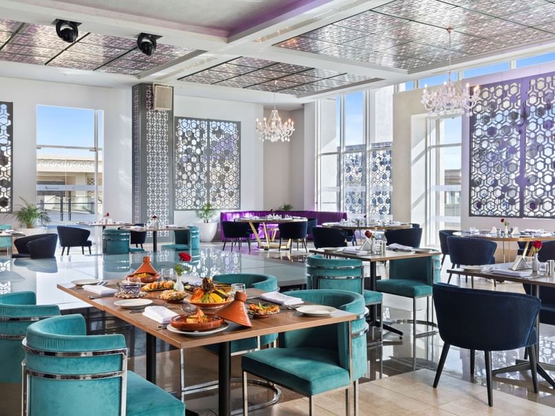 Elegant dining room with decorative walls and modern furniture at Pickalbatros White Beach Agadir.