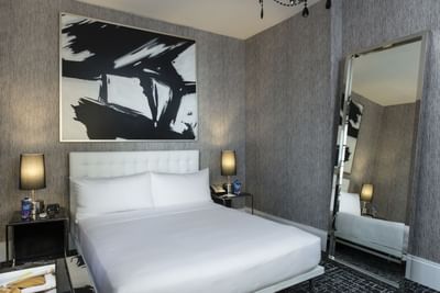 Square Hotel NYC's comfy bed in a hotel room