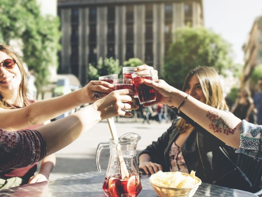 Bunch of ladies toasting glasses at Barcelona Apartments