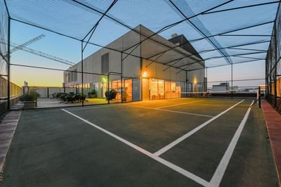 Outdoor tennis court area at Nesuto Canberra Apartment Hotel