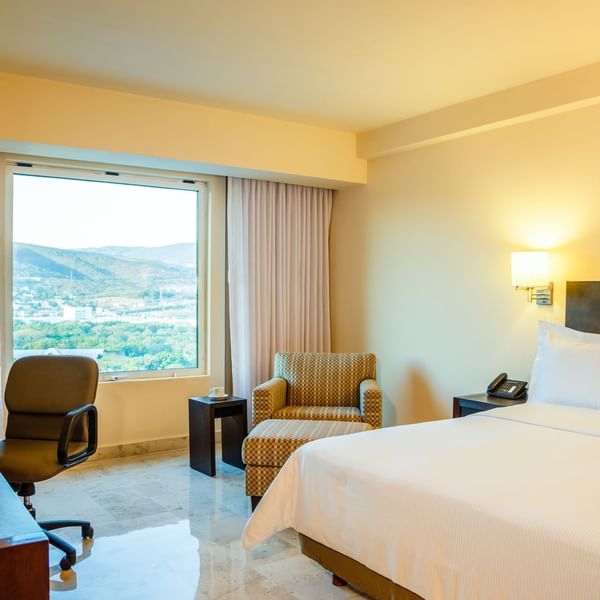 Interior of Superior Room with king bed at Fiesta Inn