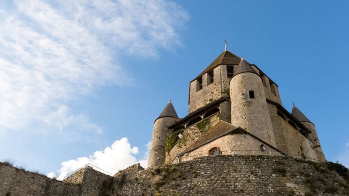 Low angle shot of César tower near Originals Hotels in Provins