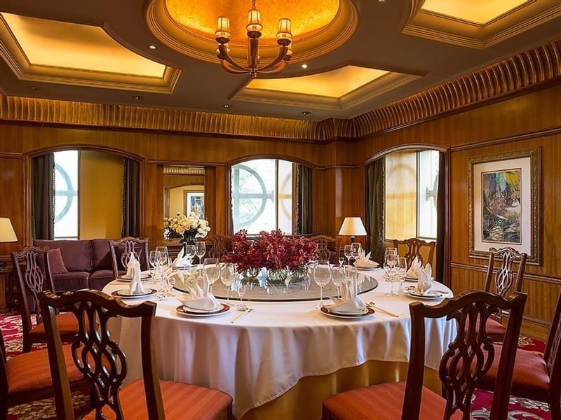 Dining table arranged in Sunshine Room Chinese Restaurant at Celebrity International Grand Hotel