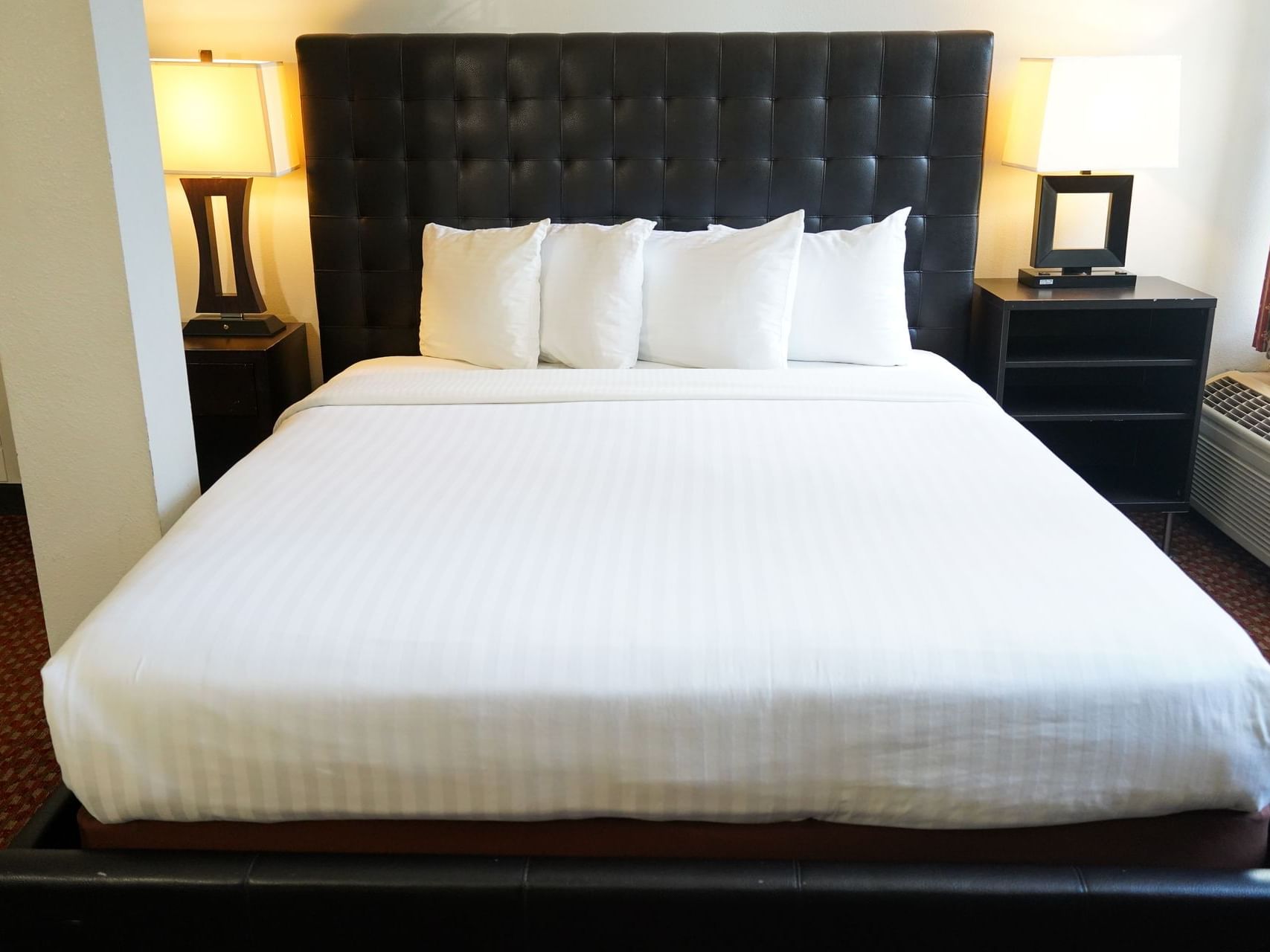 Bed of Grand 1 King & 1 Queen beds Suite at Hotel Buena Vista