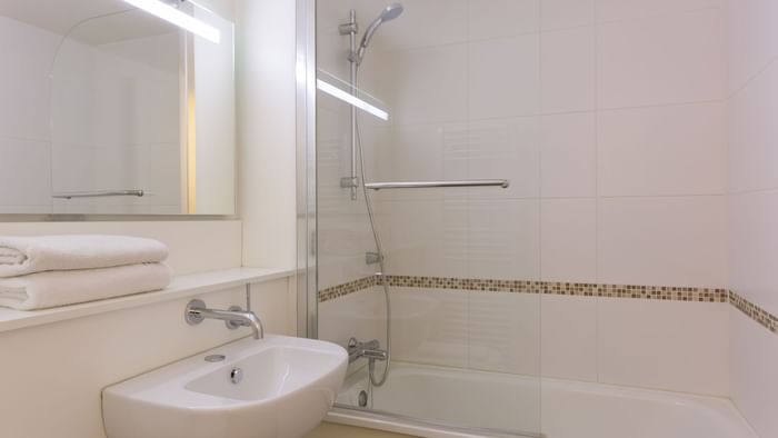 Bathroom vanity in bedrooms at Hotel Annecy Aeroport