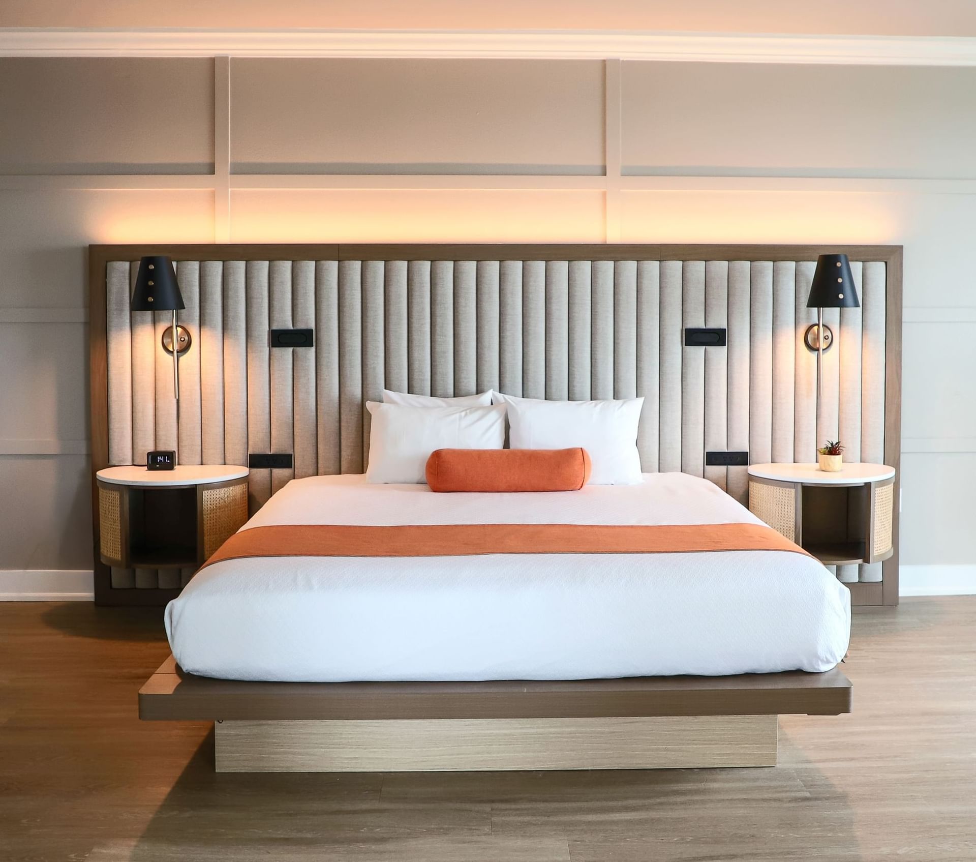 Junior Suite 1 King featuring a bed, headboard, and ambient lighting at Riverside Hotel Fort Lauderdale