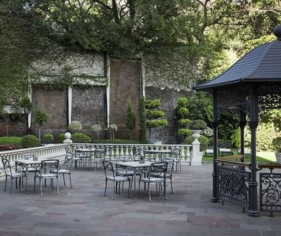 Tables & a Gazebo in a garden at Hotel Emperador Buenos Aires