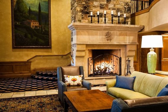 Fireplace by the lounge area with carpeted floors at The Chateaux Deer Valley