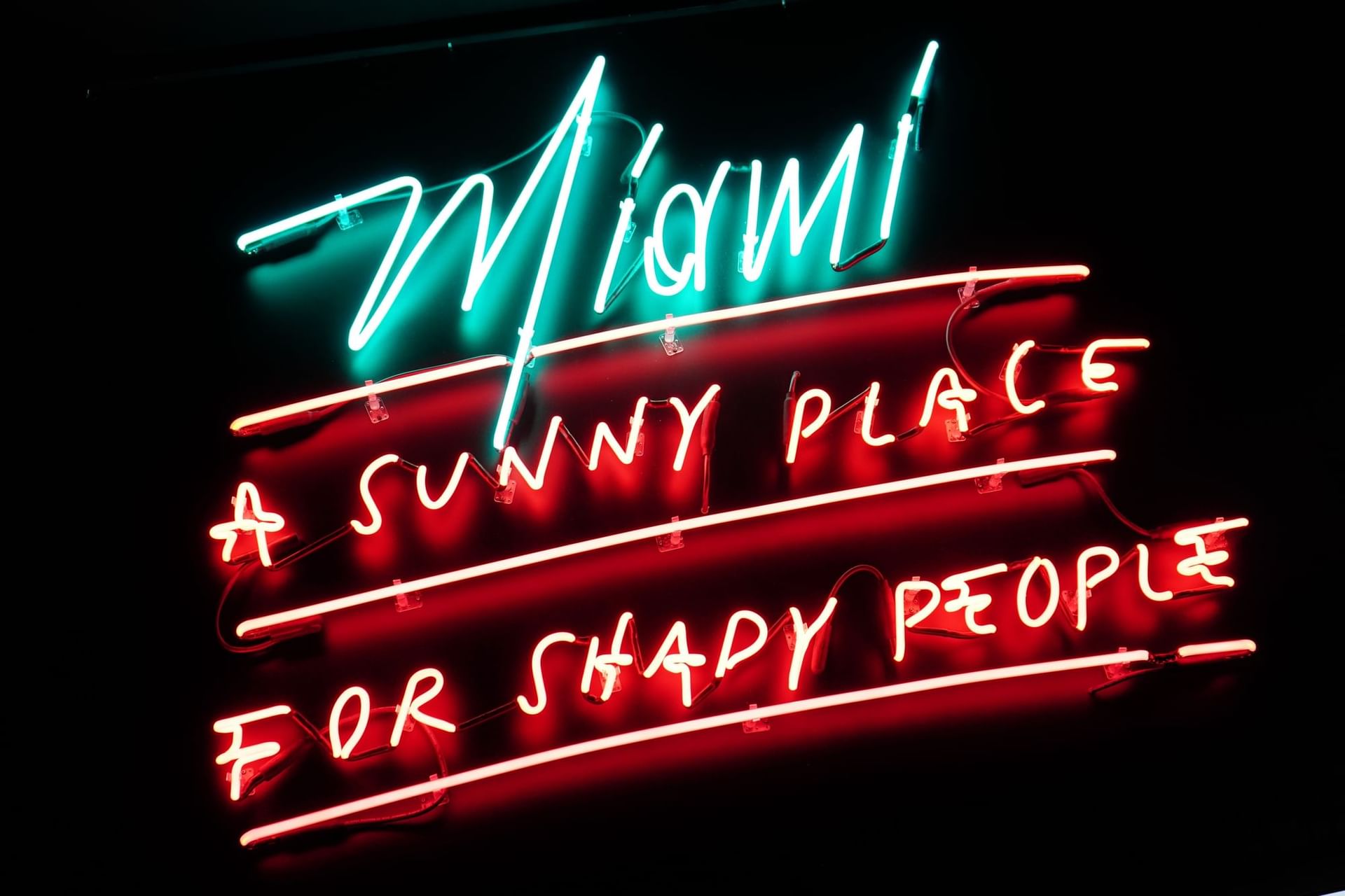 Neon sign in Kush Sports Bar at Clevelander South Beach