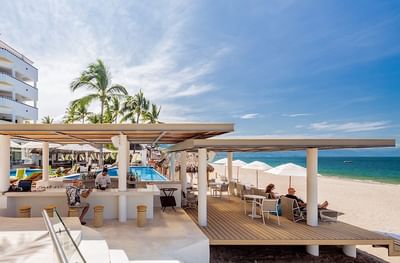 Premiere Pool Bar with loungers, palm trees and sea view at Villa Premiere Boutique Hotel & Romantic Getaway