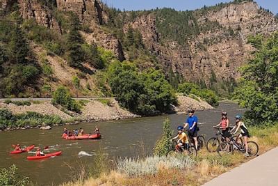 People kayaking and on bikes