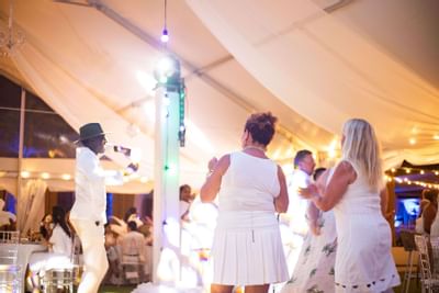 Guests dancing in a function, The Morgan Resort Spa Village
