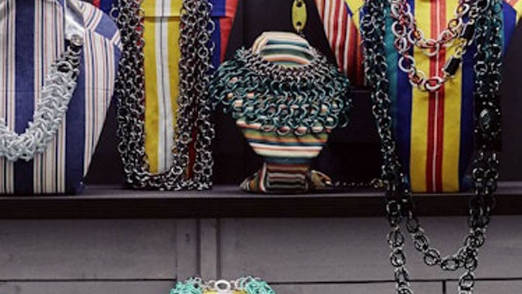 Close-up of jewelry on display in a shop near Rome Luxury Suites