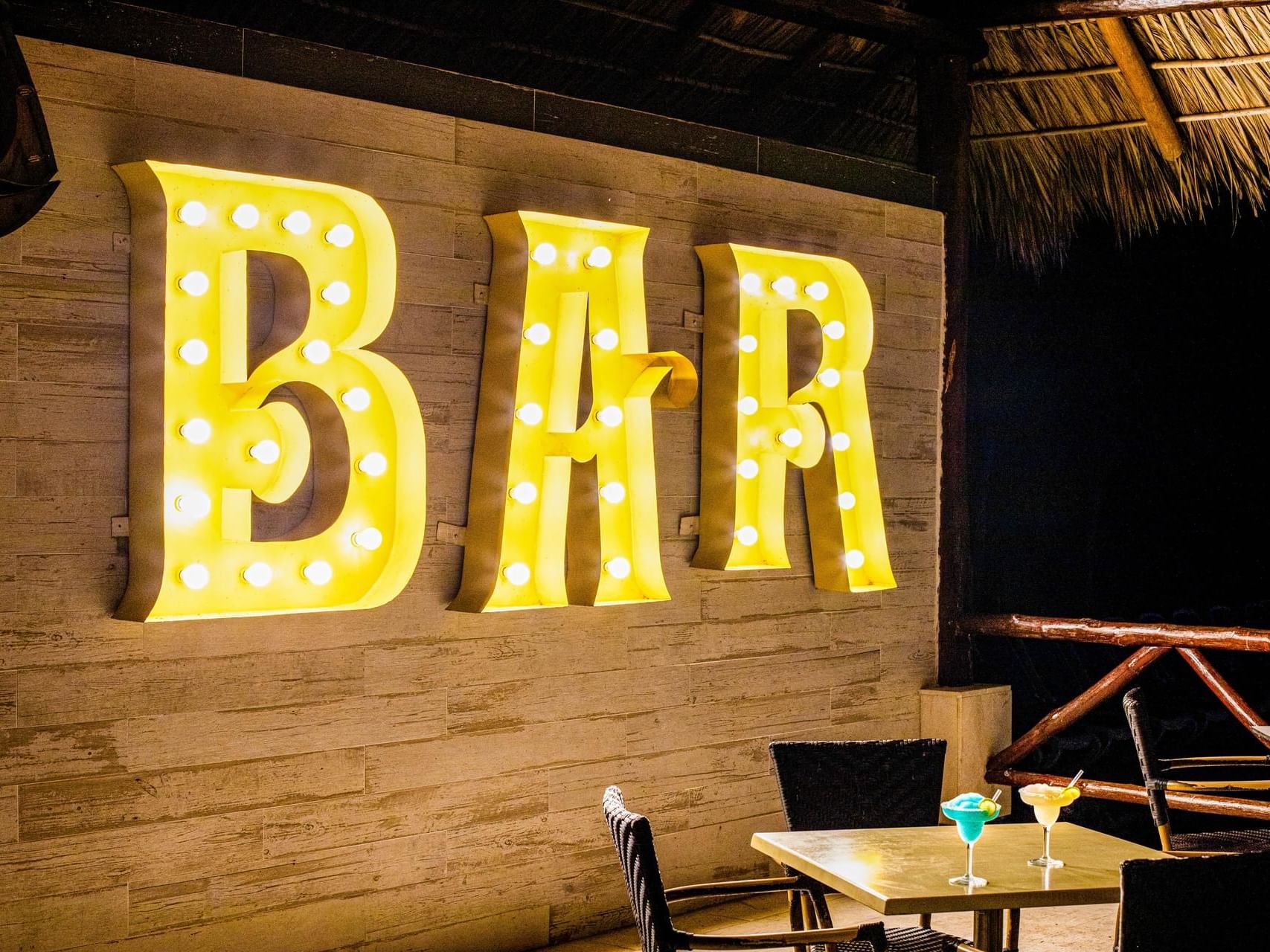 Table & sign in Snack Bar at Playa Blanca Beach Resort