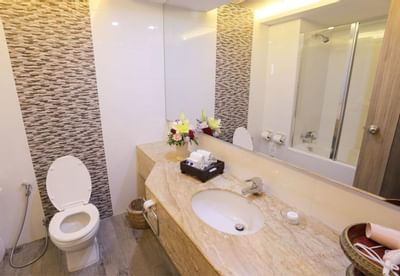 Vanity area in Superior bathroom at Amora Hotel Chiang Mai