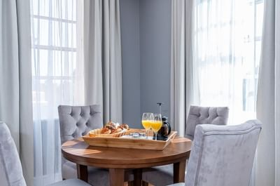 breakfast on the table inside hotel room at easthampstead park in wokingham