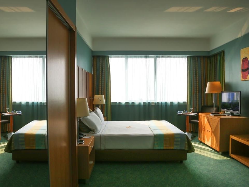 Double bed & TV in Standard Room at Hotel Presidente Luanda